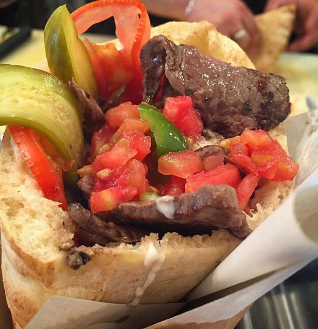 Minute steak in pita at the excellent @miznontlv by @eyaltomato #eyalshani #israel #telaviv #streetfood #pita #israelifood #eeeeeats #howisummer #eattheworld #fingerlickinfabulous #atthebar