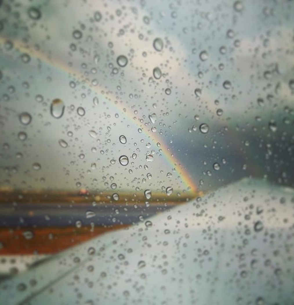 Scenes from a flight delay… #timetofly #rainbow #airplane #travel #roygbiv #runwayrainbow #sky #gettinouttadodge