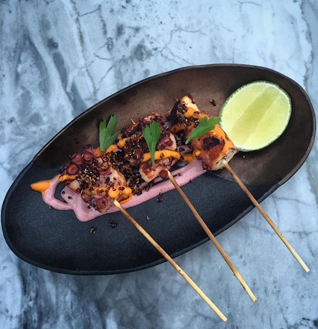 Charred Octopus Skewers, Crispy Quinoa, Rocoto Chile + Lime + SUNSET. Westlight @thewilliamvale. #brooklyn #williamsburg #hotel #lounge #skyline #bites #eeeeeats #forkyeah #thefeedfeed #howisummer #eattheworld #niceheat #freeloaderssuck